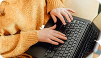 A therapist types out the Plan section in their SOAP note on their laptop. Here’s how to write the Plan section, or SOAP treatment plan, along with examples of what to include.