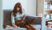 woman with laptop staying organized as a mobile slp