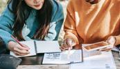 2 women studying for test