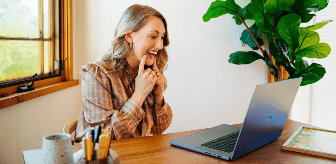 speech-language pathologist smiling on a telehealth call