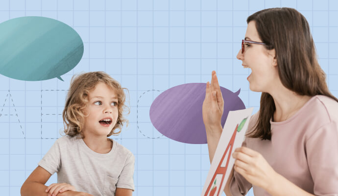 A woman sits facing a child, making a motion with her hands to indicate speech.