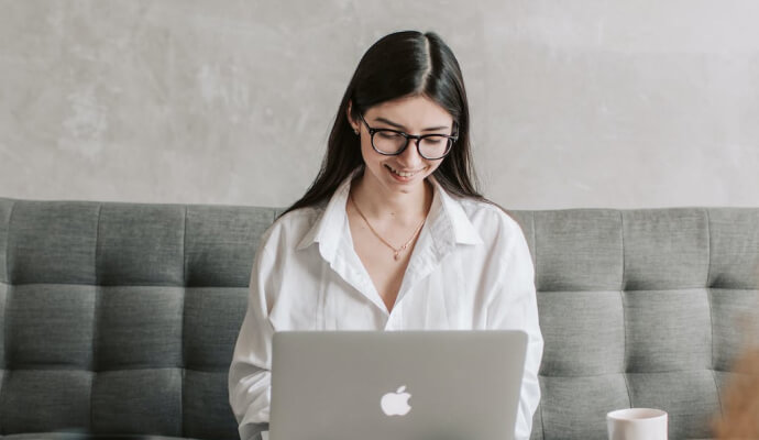 A woman is researching healthcare careers that allow work from home